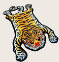 Tiger-shaped rug on a wooden floor